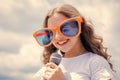 cheerful child singer singing in microphone music style, vocal Royalty Free Stock Photo