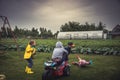 Cheerful children having fun outdoors playground during summer holidays in countryside symbolizing happy kids carefree childhood Royalty Free Stock Photo