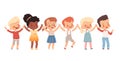 Cheerful children hold hands in a round dance. Children`s friendship