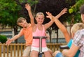 Cheerful children are teetering on the swing Royalty Free Stock Photo