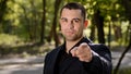 Cheerful confident adult businessman guy show hey you gesture points finger at camera make best choice handsome Royalty Free Stock Photo