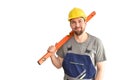 Cheerful construction worker - craftsman in working clothes with a spirit level on white background Royalty Free Stock Photo