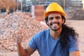 Cheerful construction worker giving thumbs up Royalty Free Stock Photo