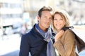 Cheerful couple being happy shopping