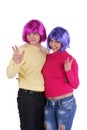 Cheerful couple in colorful wigs