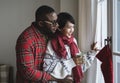 A cheerful couple enjoying Christmas holiday