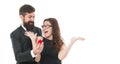 Cheerful couple. happy valentines day. formal couple in love. man present ring to woman. marry me. offer engagement ring