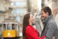 Cheerful couple looking each other in the street Royalty Free Stock Photo