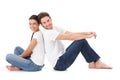 Cheerful couple smiling happily on floor Royalty Free Stock Photo