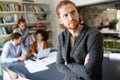 Cheerful coworkers in office during company meeting Royalty Free Stock Photo