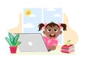 Cheerful dark-skinned girl at a laptop studying online