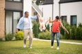 Cheerful daughter feeling happy having fun with parents