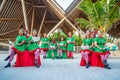 Cheerful diversity christmas elves singing song during celebration party