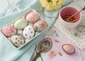Cheerful Easter Composition Featuring Pastel Fabrics and Colorful Eggs Royalty Free Stock Photo