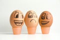 Cheerful eggs. The concept of discontent