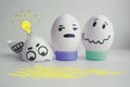 Cheerful eggs with two face concept warned Royalty Free Stock Photo