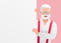 Cheerful elderly gray-haired man with glasses looks out from behind an empty poster. A white poster for advertising. Cheerful
