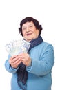 Cheerful elderly holding money