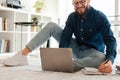 Cheerful Entrepreneur Man Using Laptop Writing Taking Notes At Home Royalty Free Stock Photo