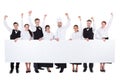 Cheerful excited catering staff showing banner Royalty Free Stock Photo