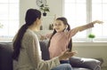 Cheerful excited daughter ready to hug loving mother family lifestyle portrait Royalty Free Stock Photo