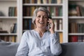 Cheerful excited senior woman making telephone call Royalty Free Stock Photo