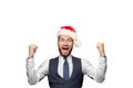 Cheerful exited businessman in Chtistmas hat smiling on white background