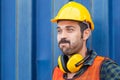 Cheerful factory worker man in hard hat smiling and looking at camera with joy, Happiness and funny concept Royalty Free Stock Photo