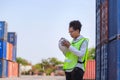 Cheerful factory worker woman holding hard hat smiling, Happiness Female engineers for concept Royalty Free Stock Photo