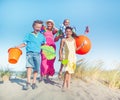Cheerful Family Bonding by the Beach Royalty Free Stock Photo