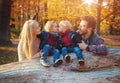 Family enjoying an autumn weather in a forest