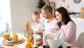 Cheerful family having breakfast together Royalty Free Stock Photo