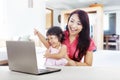 Cheerful family with laptop computer Royalty Free Stock Photo