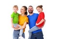 Cheerful family looking at camera in studio Royalty Free Stock Photo