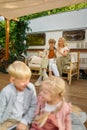 Cheerful family relaxing at the motorhome, campers