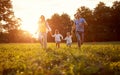 Cheerful family together enjoying outside