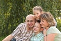 Cheerful family with two children in fall park Royalty Free Stock Photo