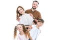 cheerful family with two children standing together and smiling at camera Royalty Free Stock Photo