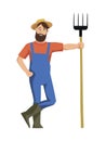 Cheerful farmer stands and leans on the pitchfork