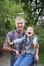 Cheerful father and daughter