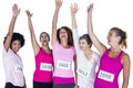 Cheerful female athletes with arms raised Royalty Free Stock Photo