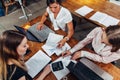 Cheerful female business partners having a meeting discussing sales strategies in a conference room Royalty Free Stock Photo