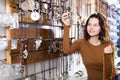 Female offering to buy fashionable necklace