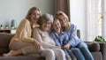 Cheerful female relatives of different ages, generations home portrait Royalty Free Stock Photo