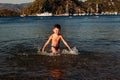 Cheerful five-year-old boy at sea in Turkey