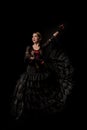 Flamenco dancer in dress holding castanets Royalty Free Stock Photo