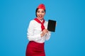 Cheerful flight attendant advertising airline app Royalty Free Stock Photo