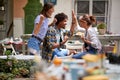 Cheerful friends rejoices together in cafe