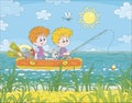 Little boys in an inflatable boat fishing in a lake