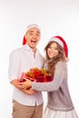 Cheerful funny couples holding red presents and laughing Royalty Free Stock Photo